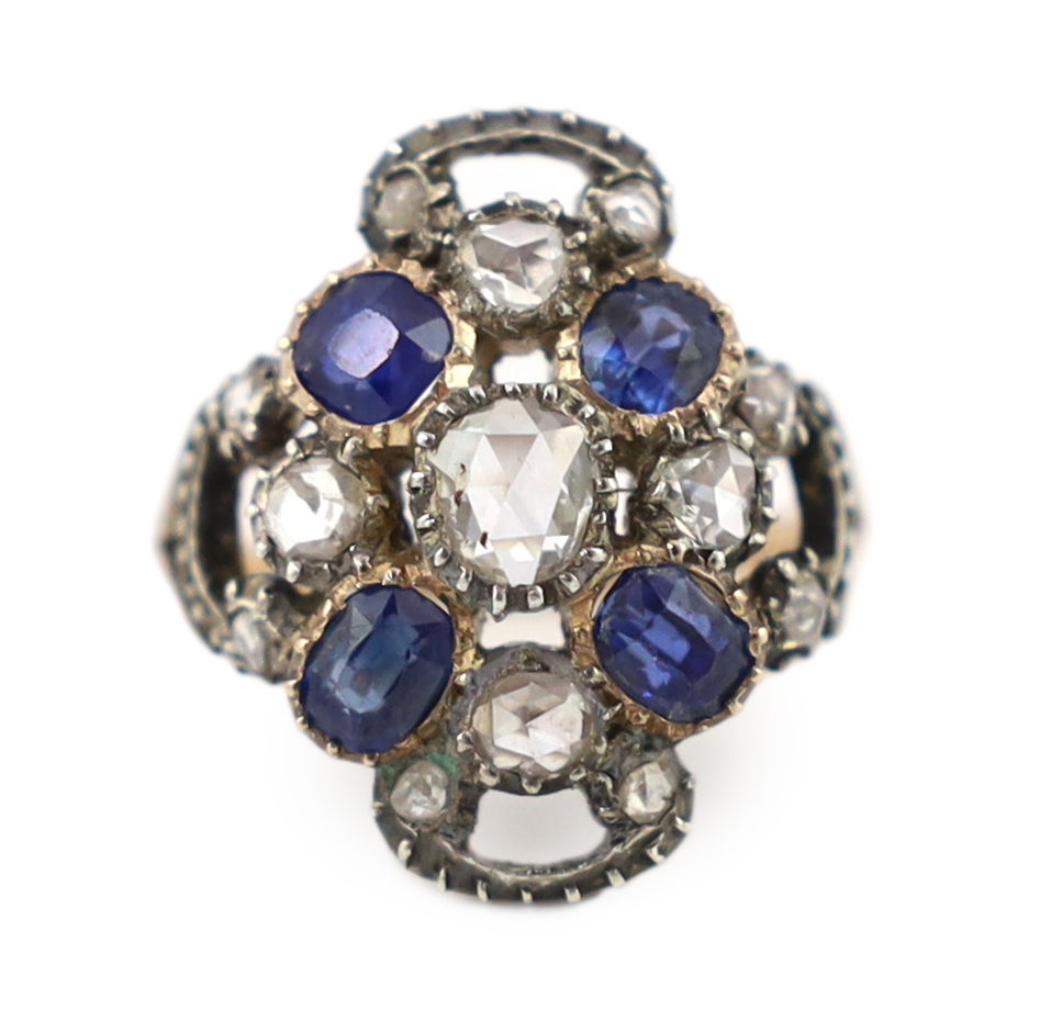 An antique gold and silver, sapphire and rose cut diamond cluster set dress ring